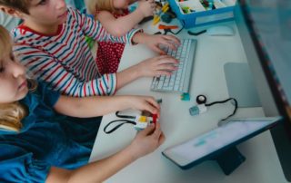 Kids building robot and programming