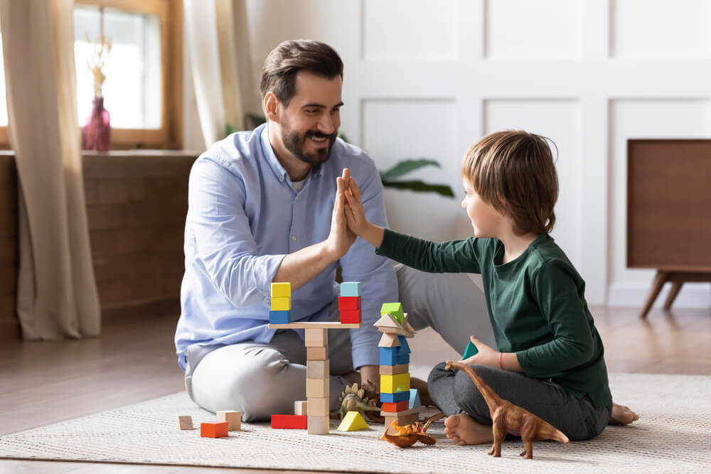 Father engaged in Activity Game With Son