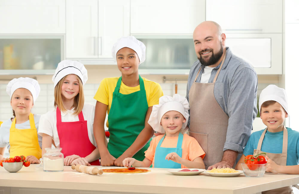 Children and Teacher in Kitchen During Cooking Classes